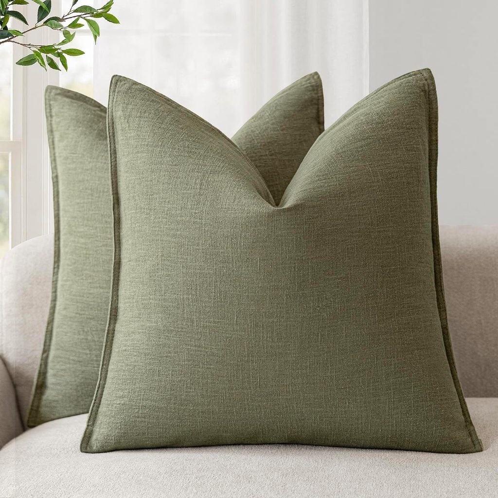 Muted olive green decorative pillow for a neutral fall living room