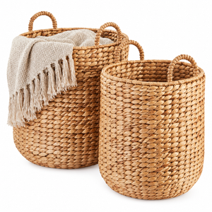 Natural woven storage baskets with handles for a warm neutral entryway